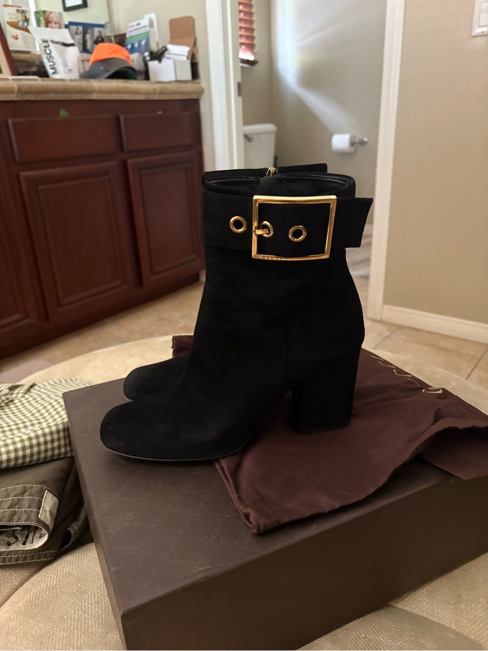 Gucci Black Suede Ankle Boots with Gold Buckle Accent